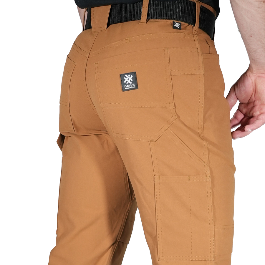 Work shorts with top knee pads